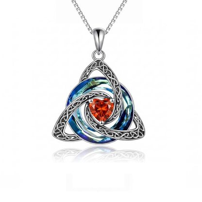 July · Ruby witch knot pendant